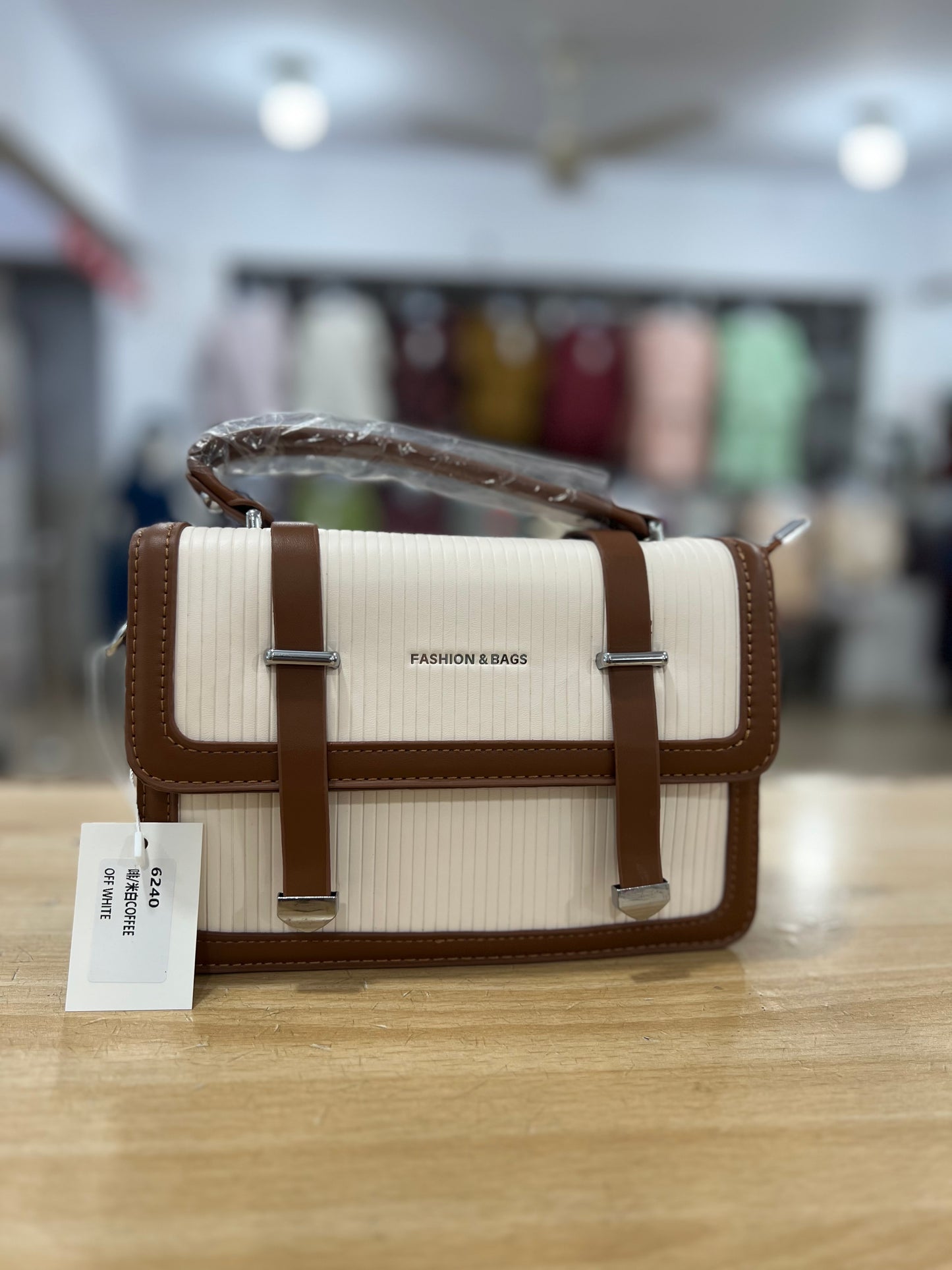 Elegant Structured Handbag with Long Belt