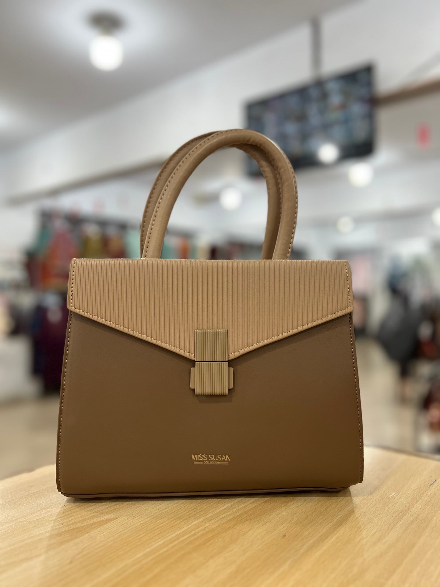 Elegant Two-Tone Top Handle Handbag with Adjustable Long Shoulder Strap