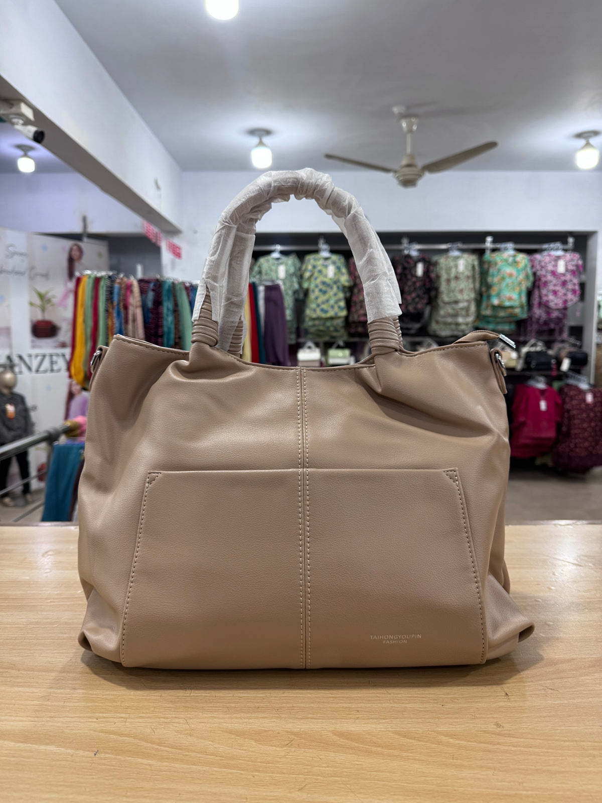 Elegant Spacious Handbag with Long Crossbody Belt