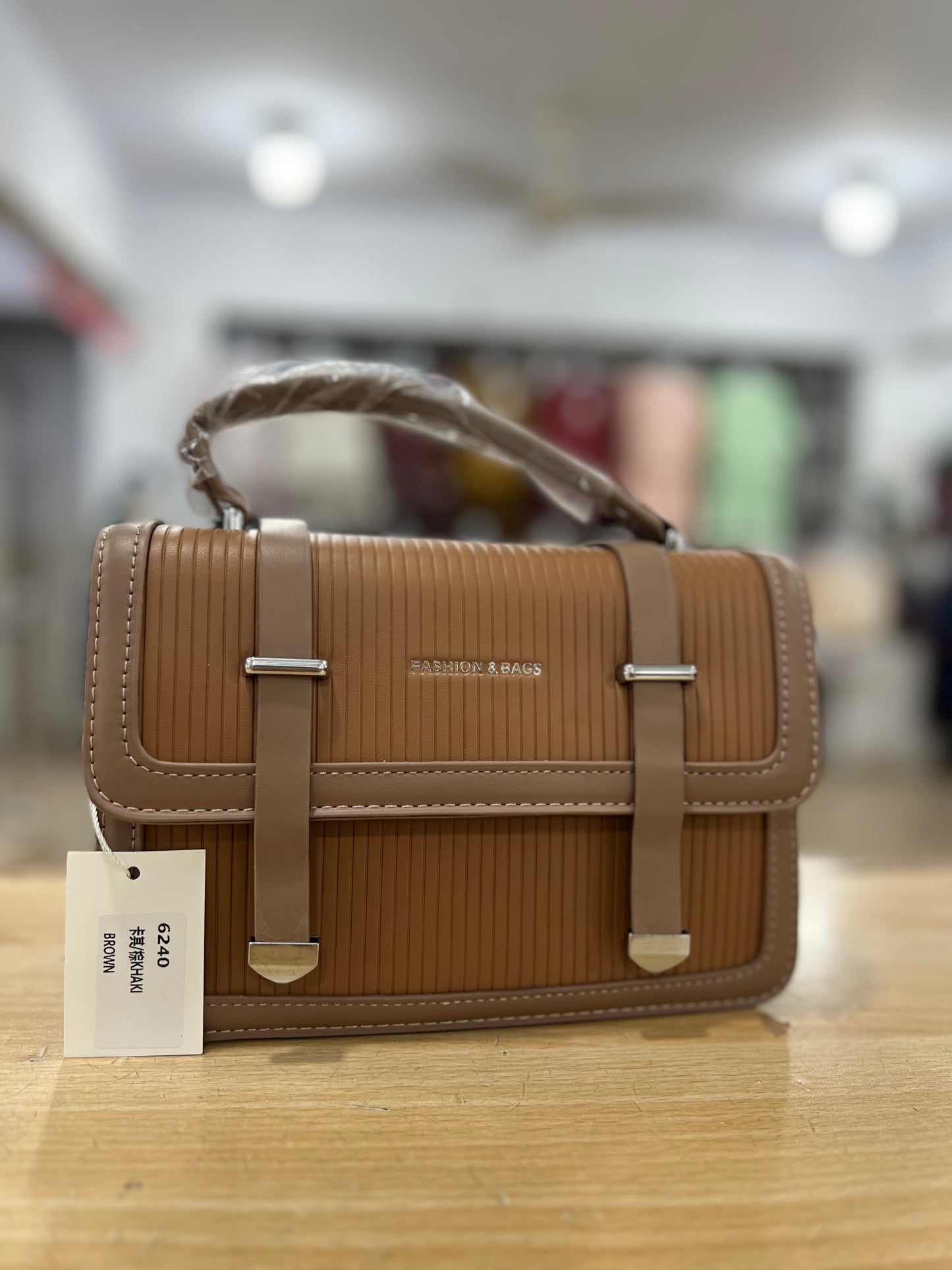 Elegant Structured Handbag with Long Belt