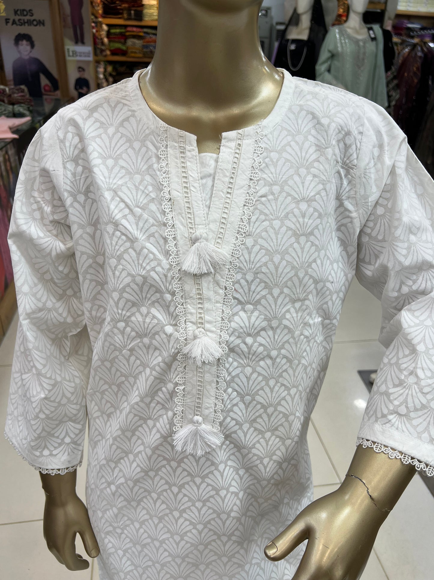 Girls Elegant White Textured 2-Piece Suit – Tassel Detail Kurti & Trouser Set