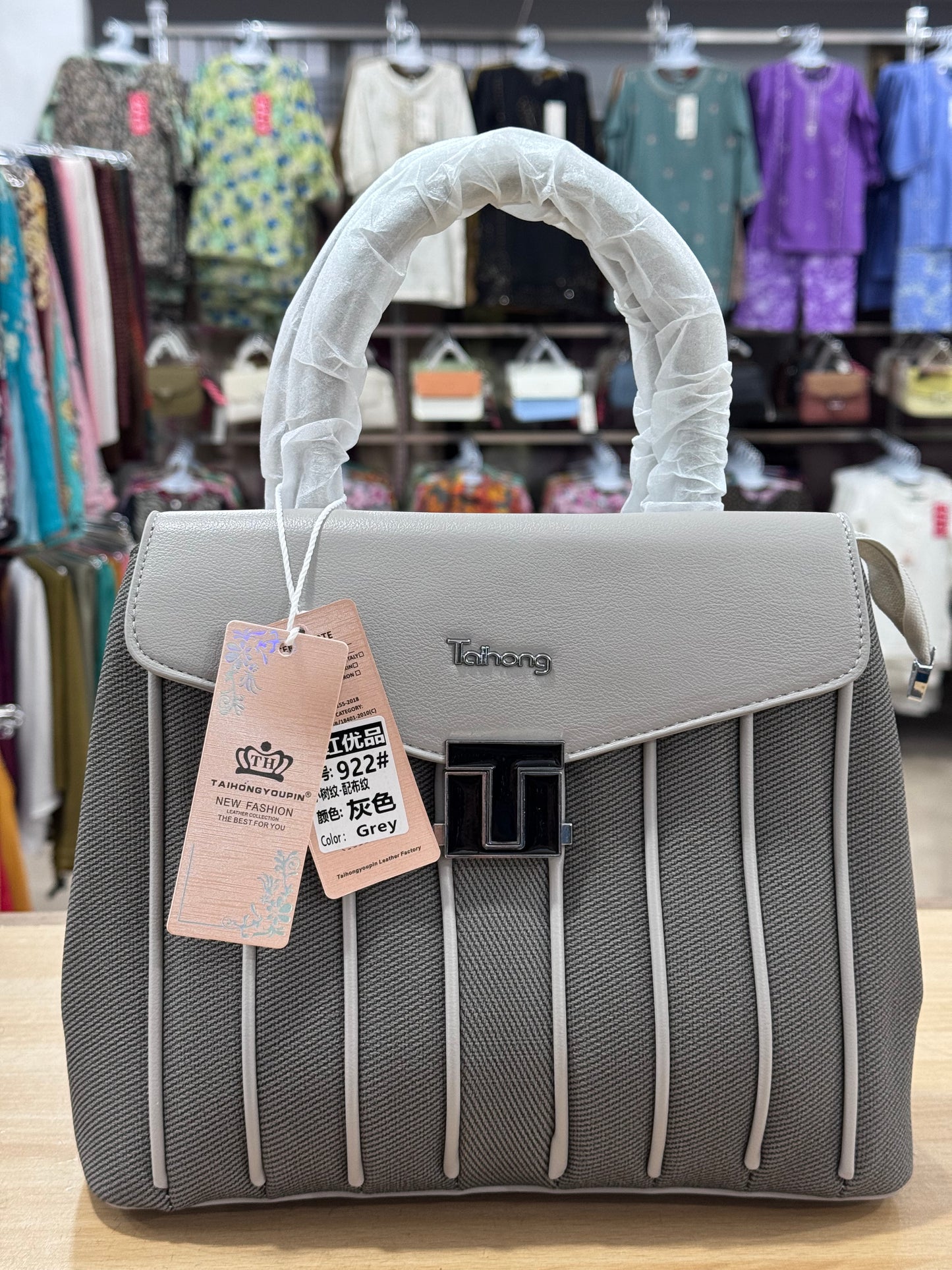 Elegant Structured Handbag with Adjustable Long Shoulder Strap