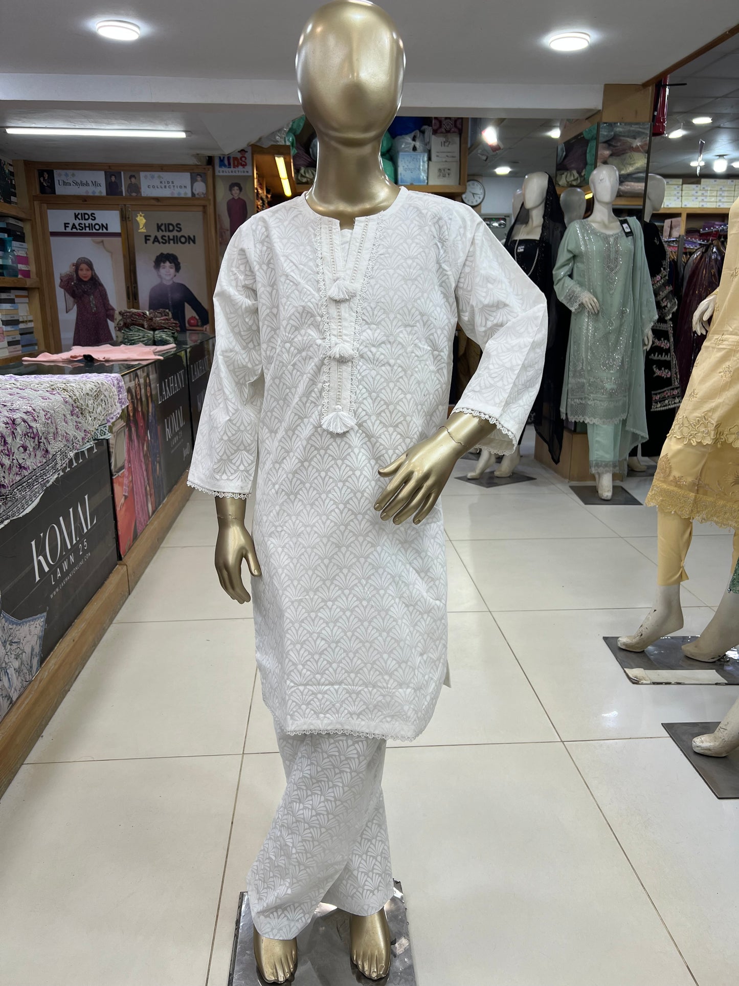 Girls Elegant White Textured 2-Piece Suit – Tassel Detail Kurti & Trouser Set