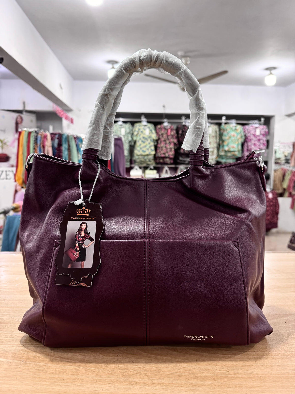 Elegant Spacious Handbag with Long Crossbody Belt