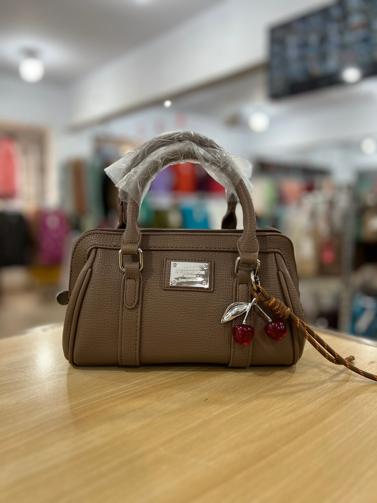 Elegant Mini Crossbody Bag with Cherry Keychain