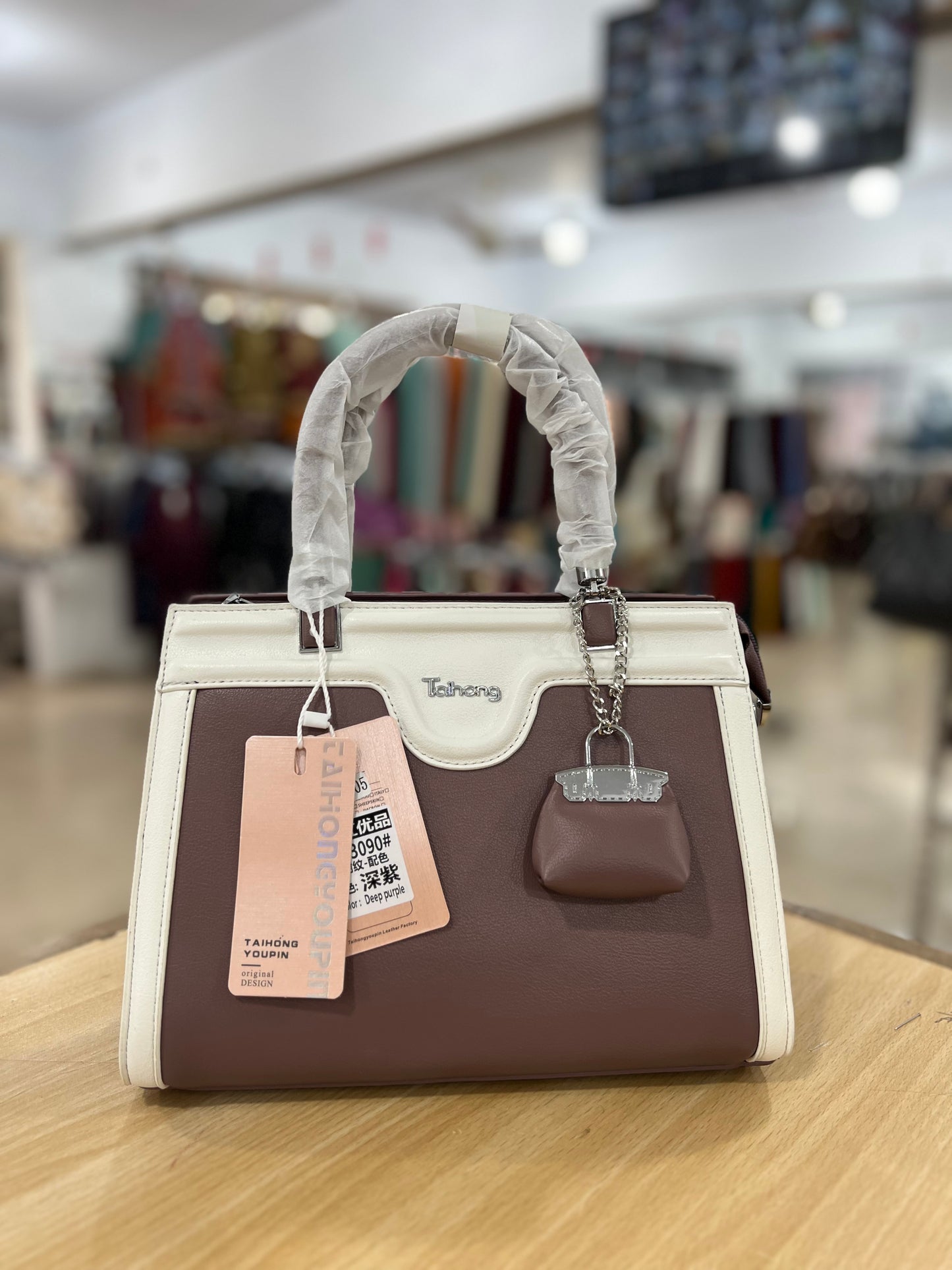 Elegant Two-Tone Handbag with Mini Bag Charm & Long Belt