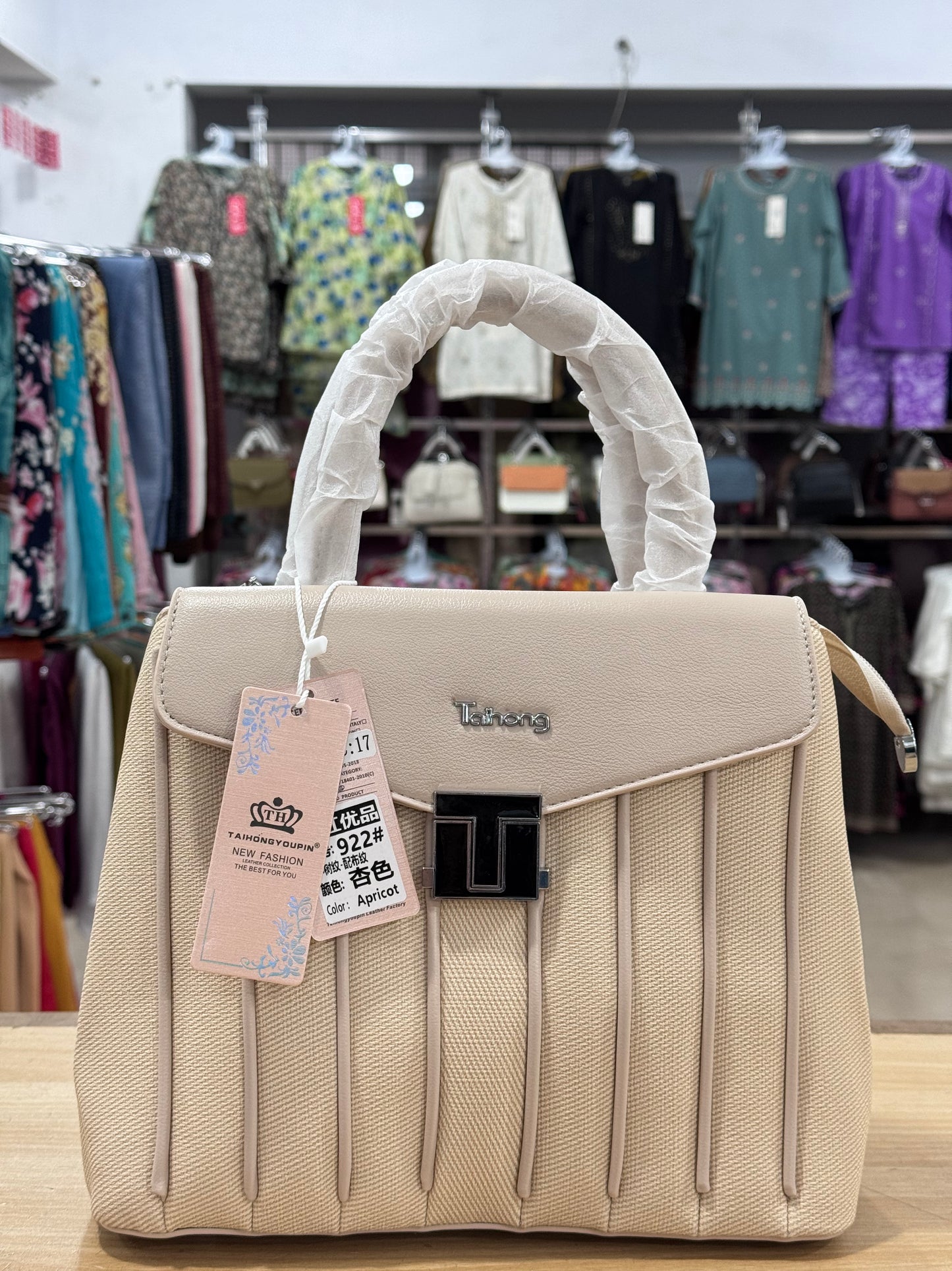 Elegant Structured Handbag with Adjustable Long Shoulder Strap