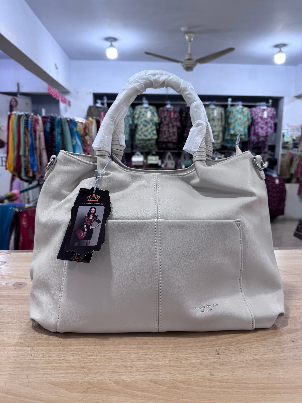 Elegant Spacious Handbag with Long Crossbody Belt