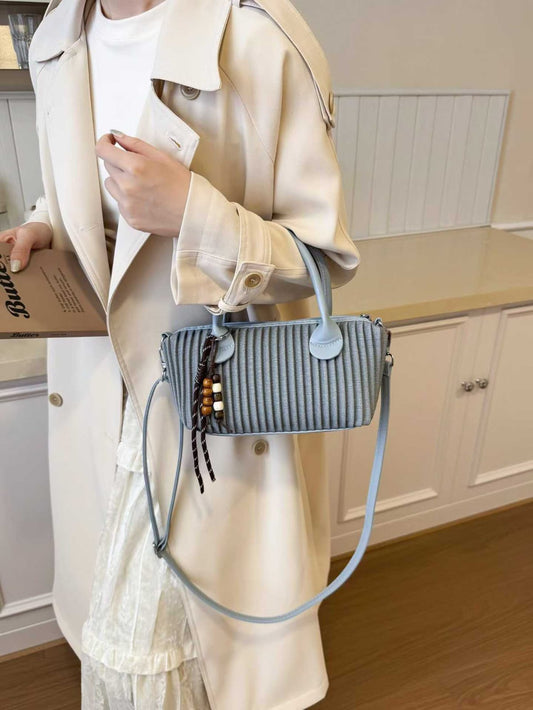 Elegant Ribbed Mini Handbag with Adjustable Long Crossbody Strap