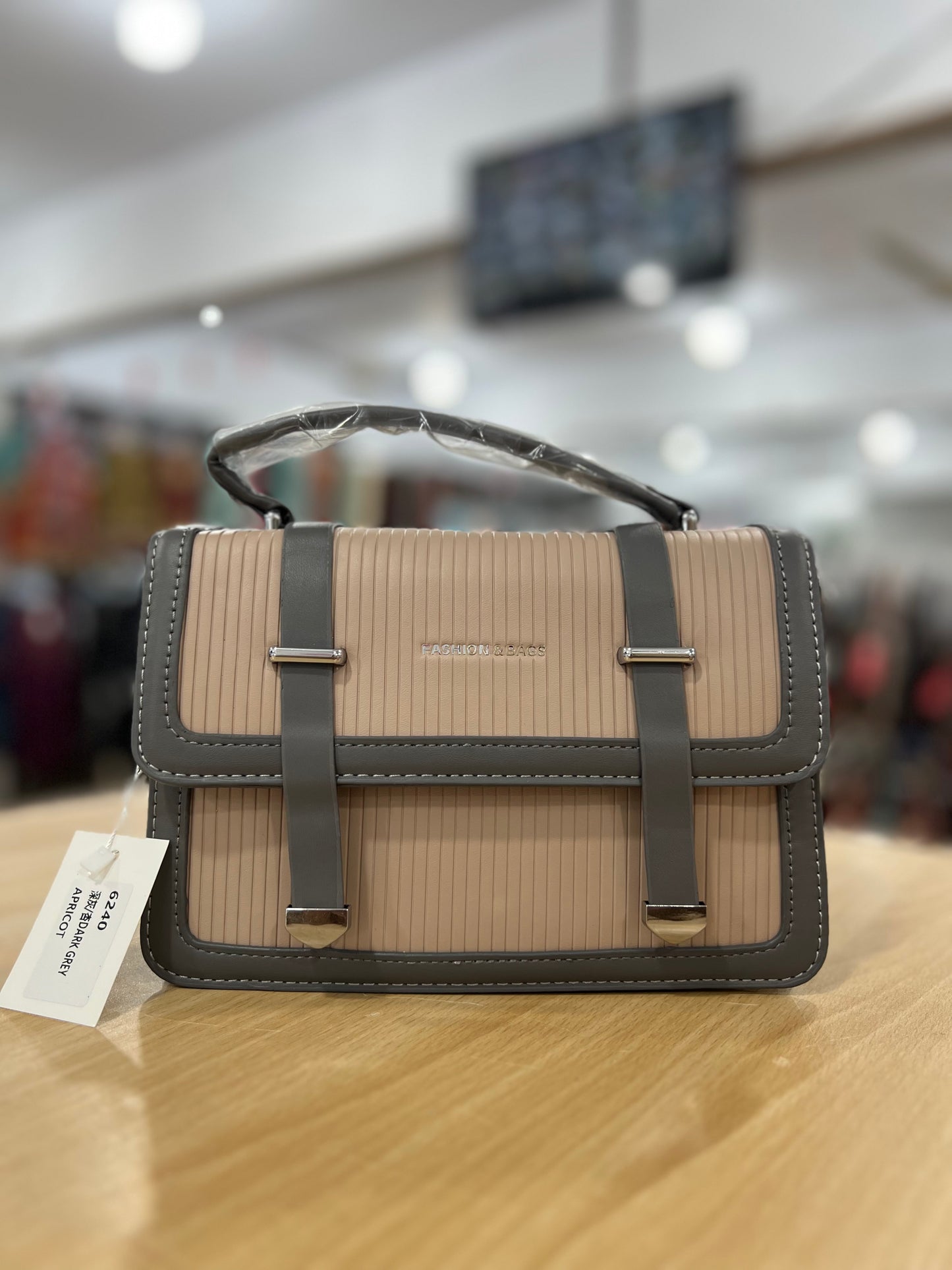 Elegant Structured Handbag with Long Belt