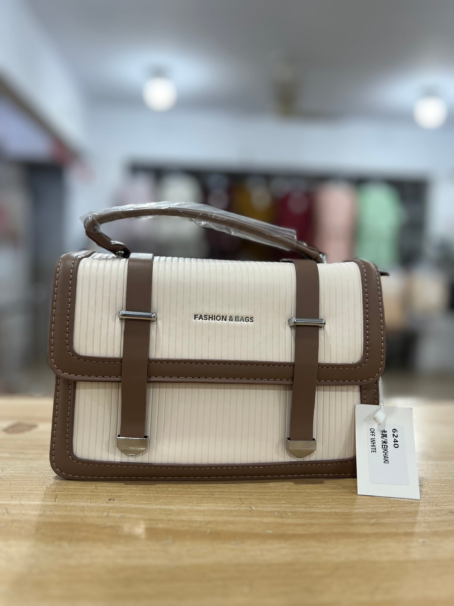 Elegant Structured Handbag with Long Belt