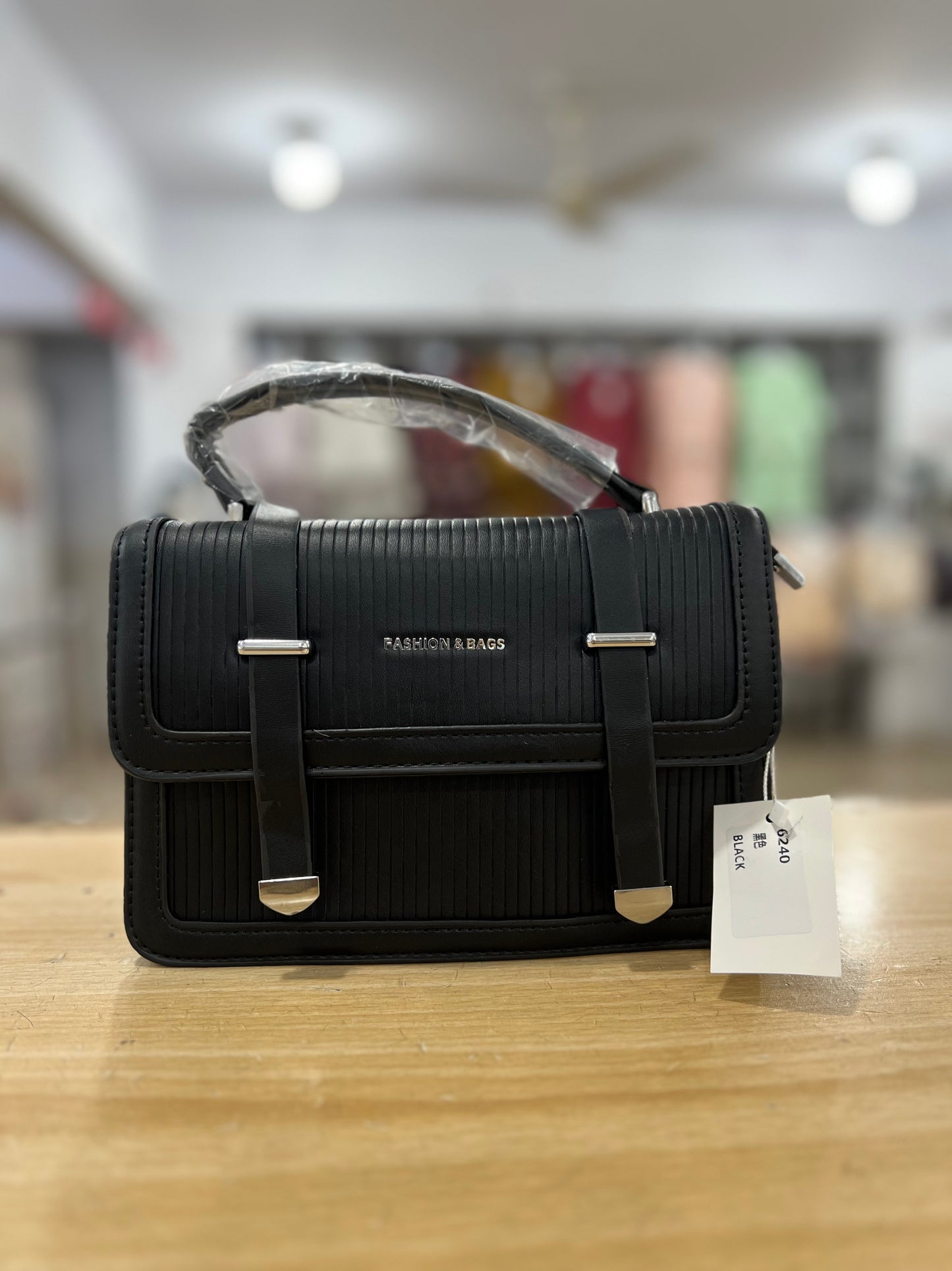Elegant Structured Handbag with Long Belt