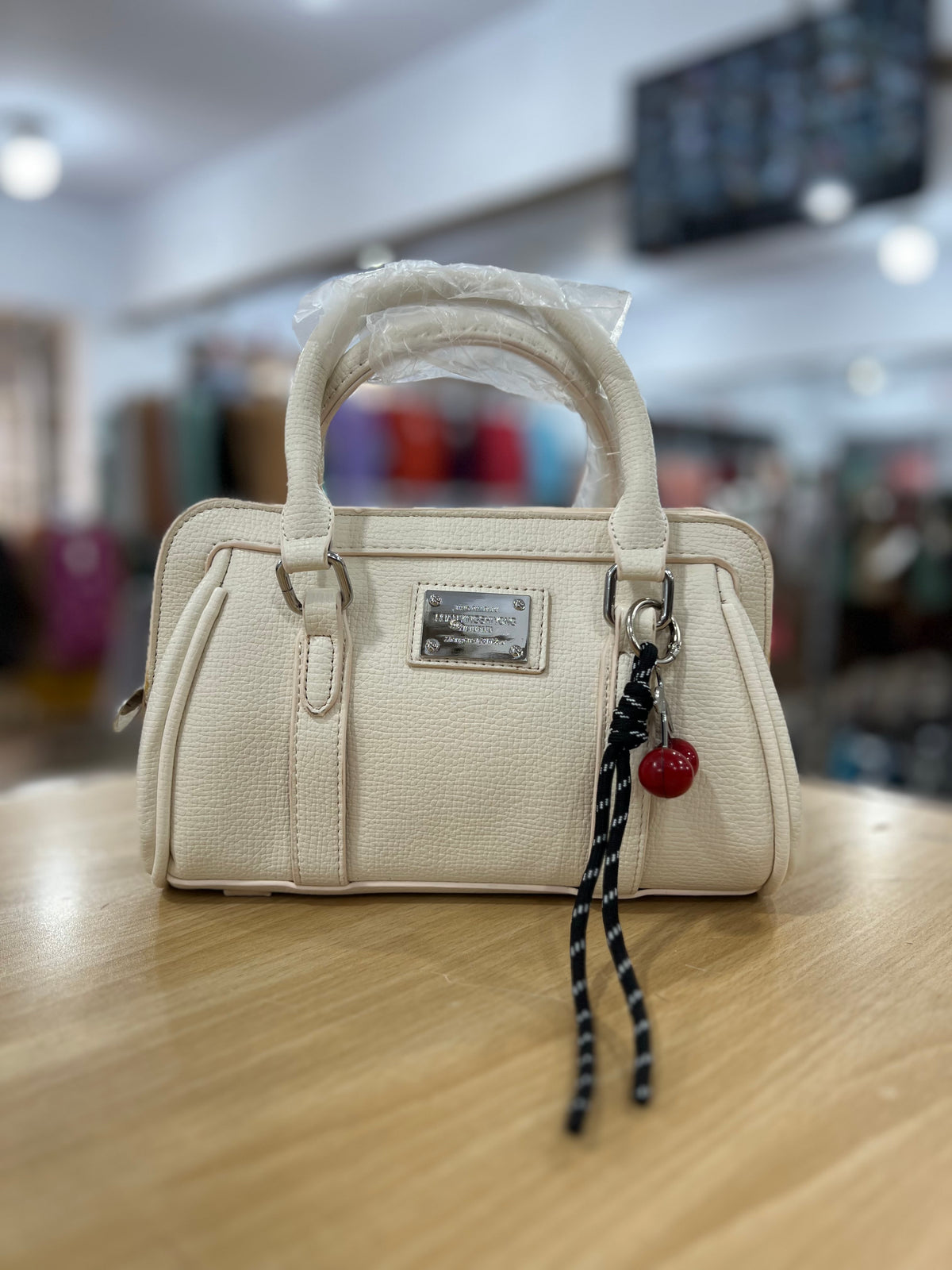 Elegant Mini Crossbody Bag with Cherry Keychain