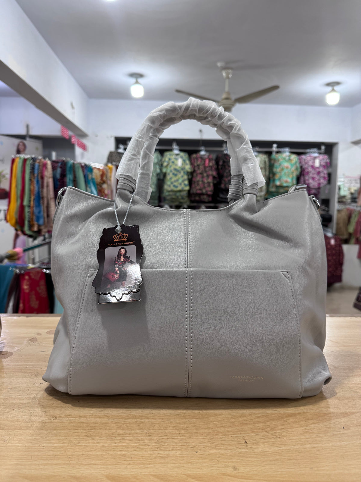 Elegant Spacious Handbag with Long Crossbody Belt
