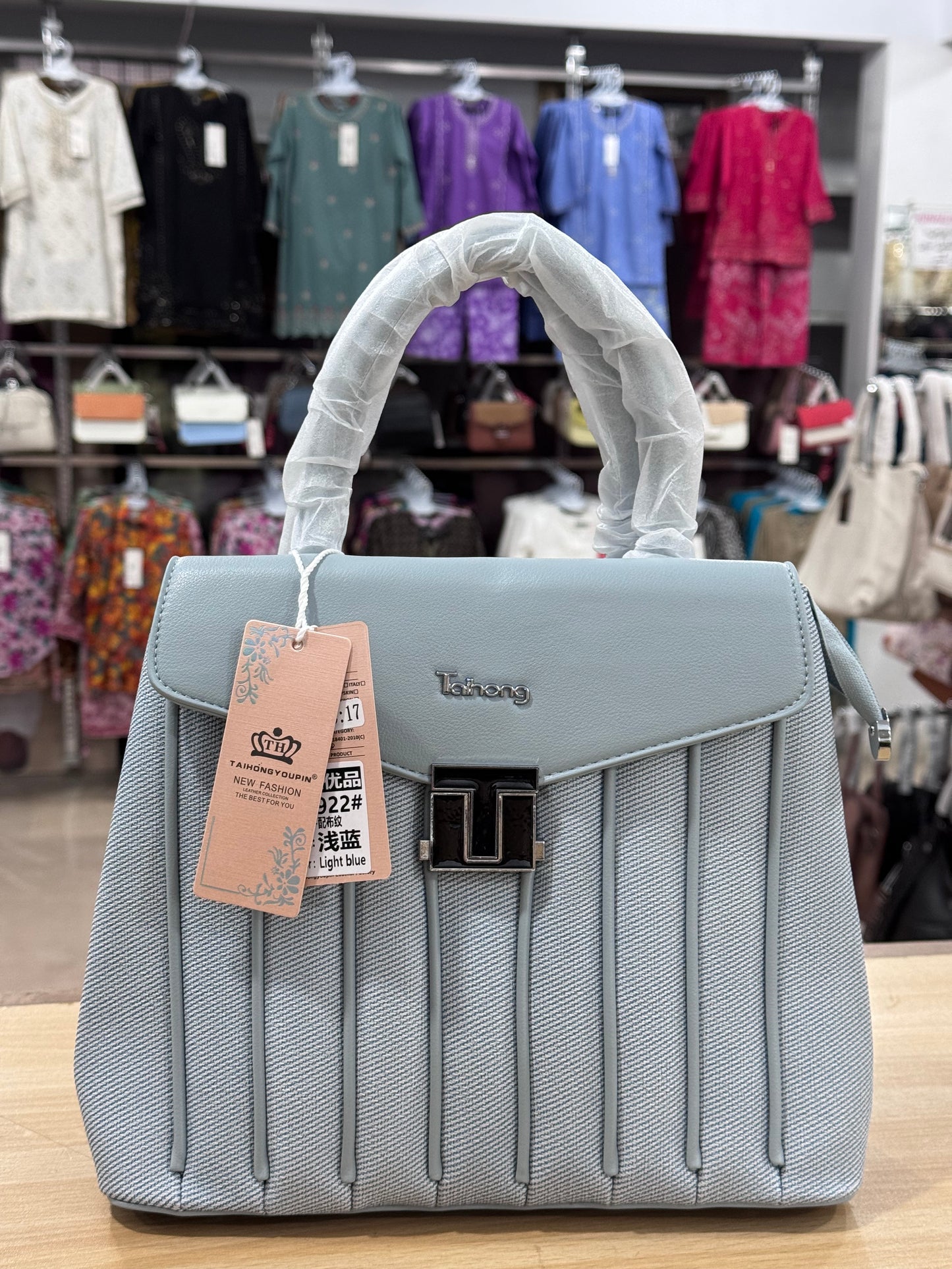 Elegant Structured Handbag with Adjustable Long Shoulder Strap